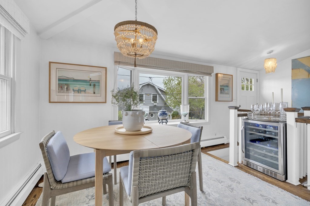 94 Pitman Road Marblehead, MA 01945 - Photo 4 of 35 a dining room with furniture a chandelier and window