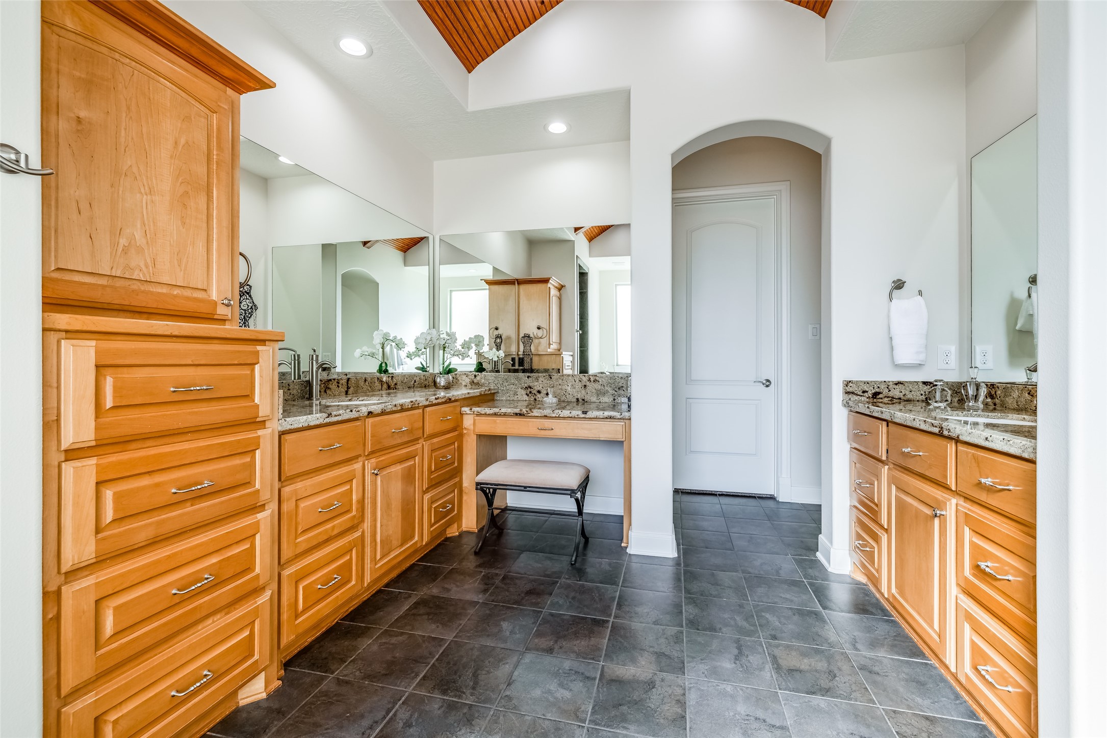 31102 Lower Oxbow Trace Fulshear, TX 77441 - Photo 23 of 50 Wonderful huge Primary bathroom with large shower with glass door, huge soaking tub, tile floor, lots of cabinets, dual vanity units, large mirrors, knee space - arch through to 2 large closets- not shown in the pictures