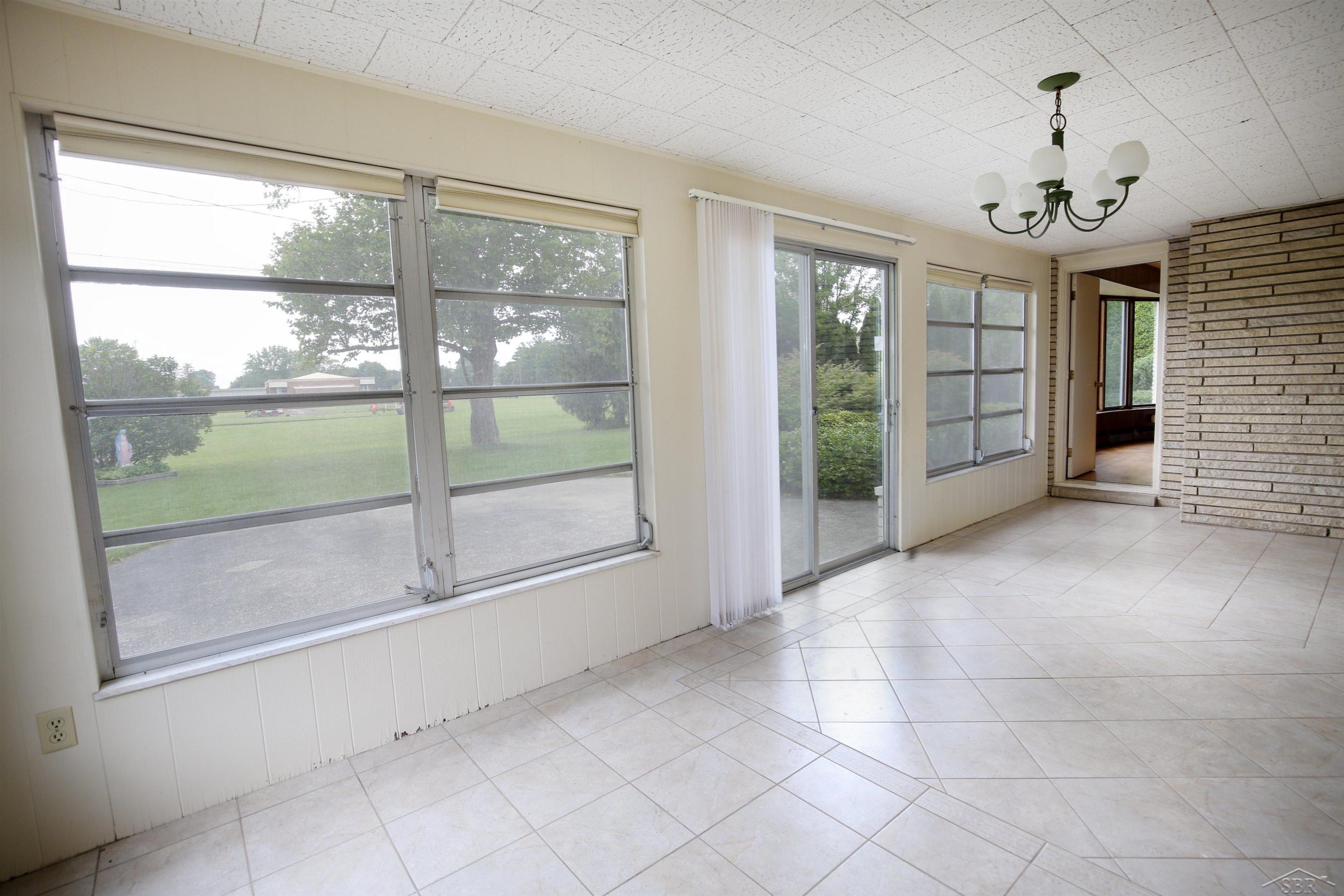 636 Stoneham Road Saginaw, MI 48638 - Photo 25 of 54 Screened Porch