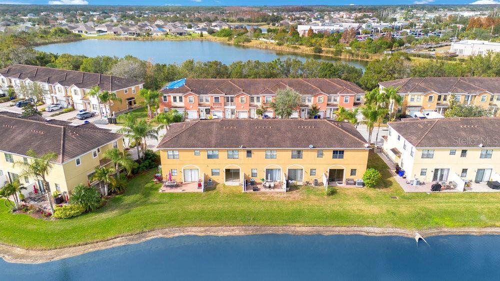 3466 Allegra Circle St. Cloud, FL 34772 - Photo 26 of 29 a view of a city with tall buildings in the background