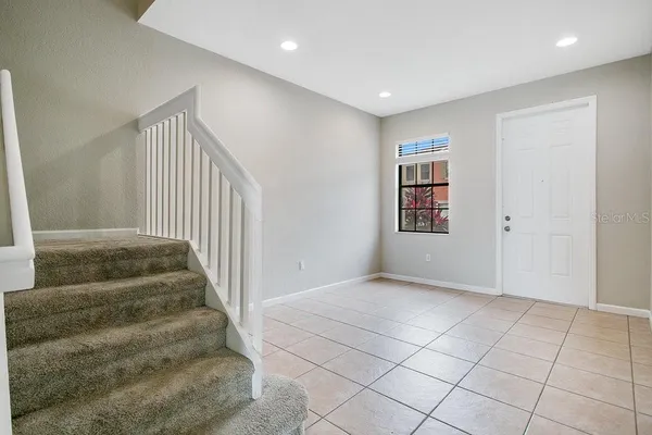 a view of an entryway with staircase