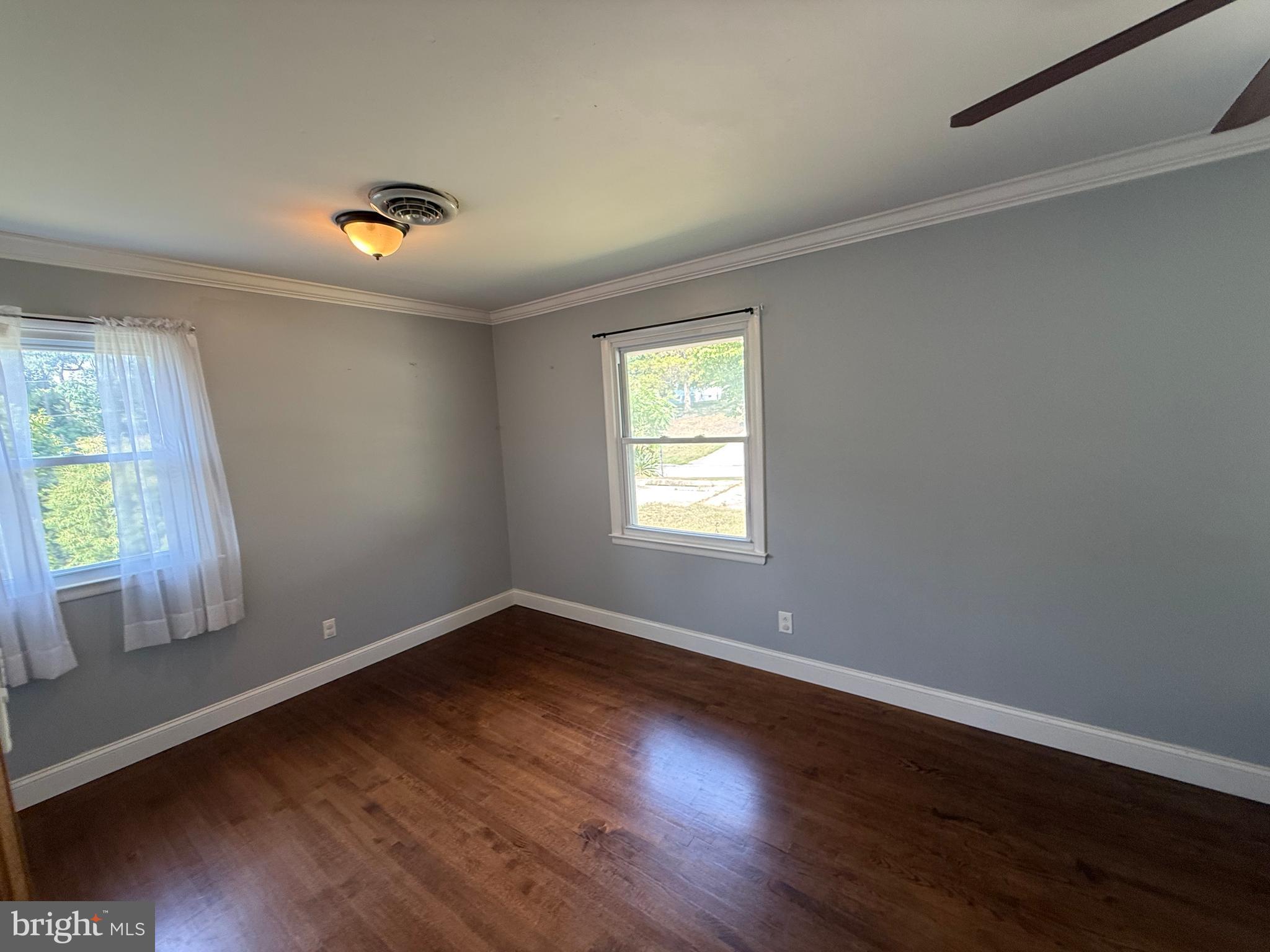 858 Star Court Union Bridge, MD 21791 - Photo 17 of 37 wooden floor in an empty room with a window
