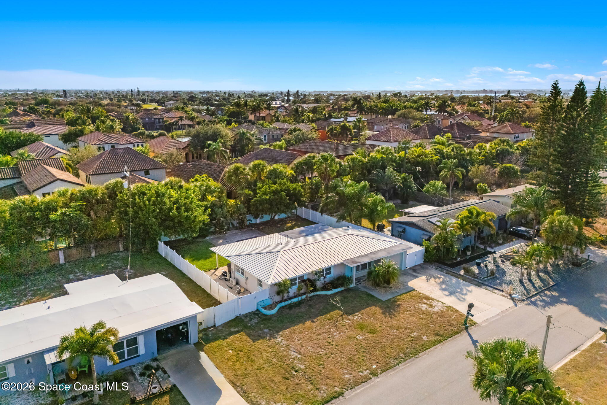 340 West Exeter Street Satellite Beach, FL 32937 - Photo 30 of 39 an aerial view of a house with a yard