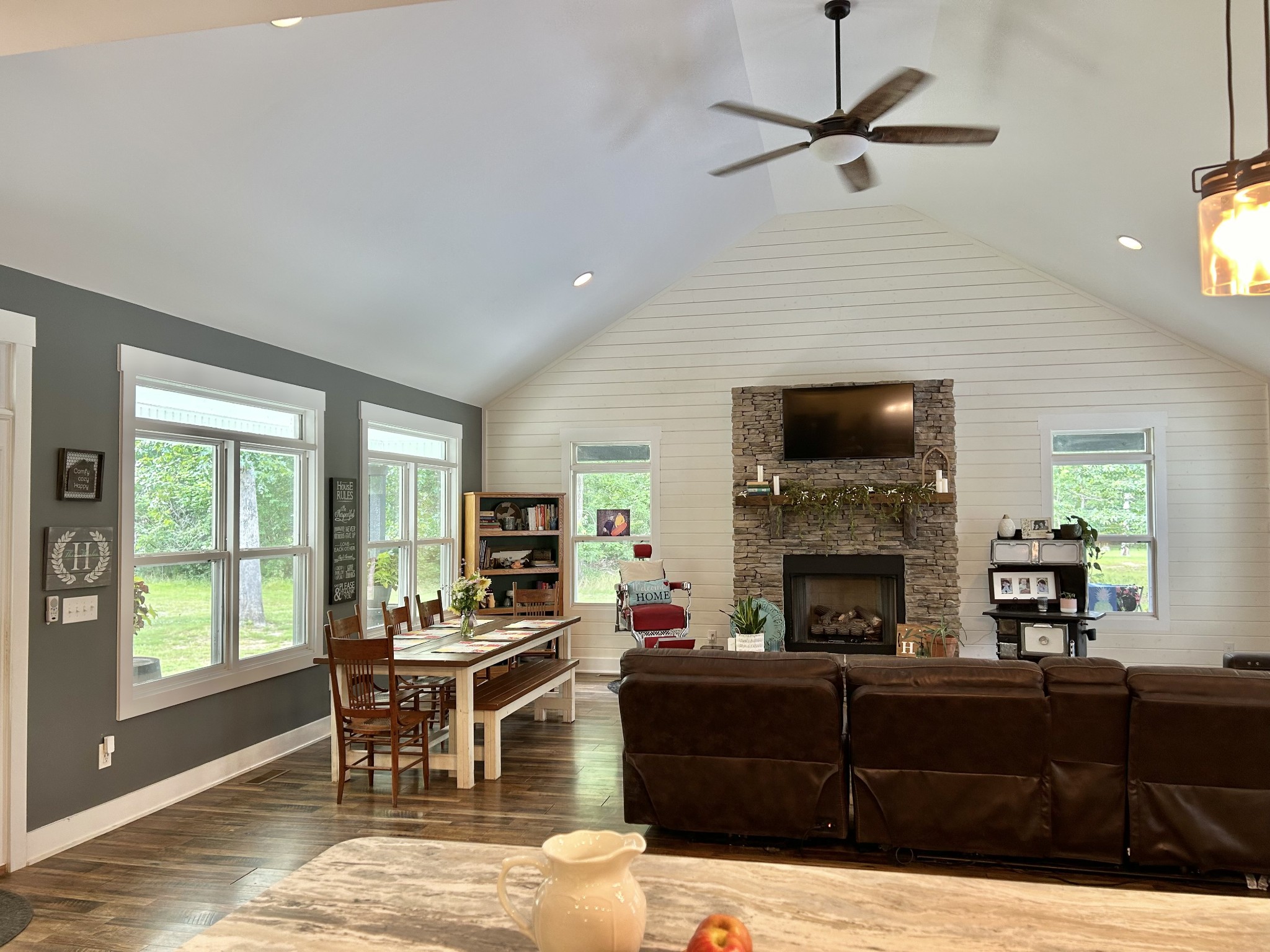 795 Cat Creek Road Manchester, TN 37355 - Photo 11 of 58 a living room with furniture a fireplace and a flat screen tv
