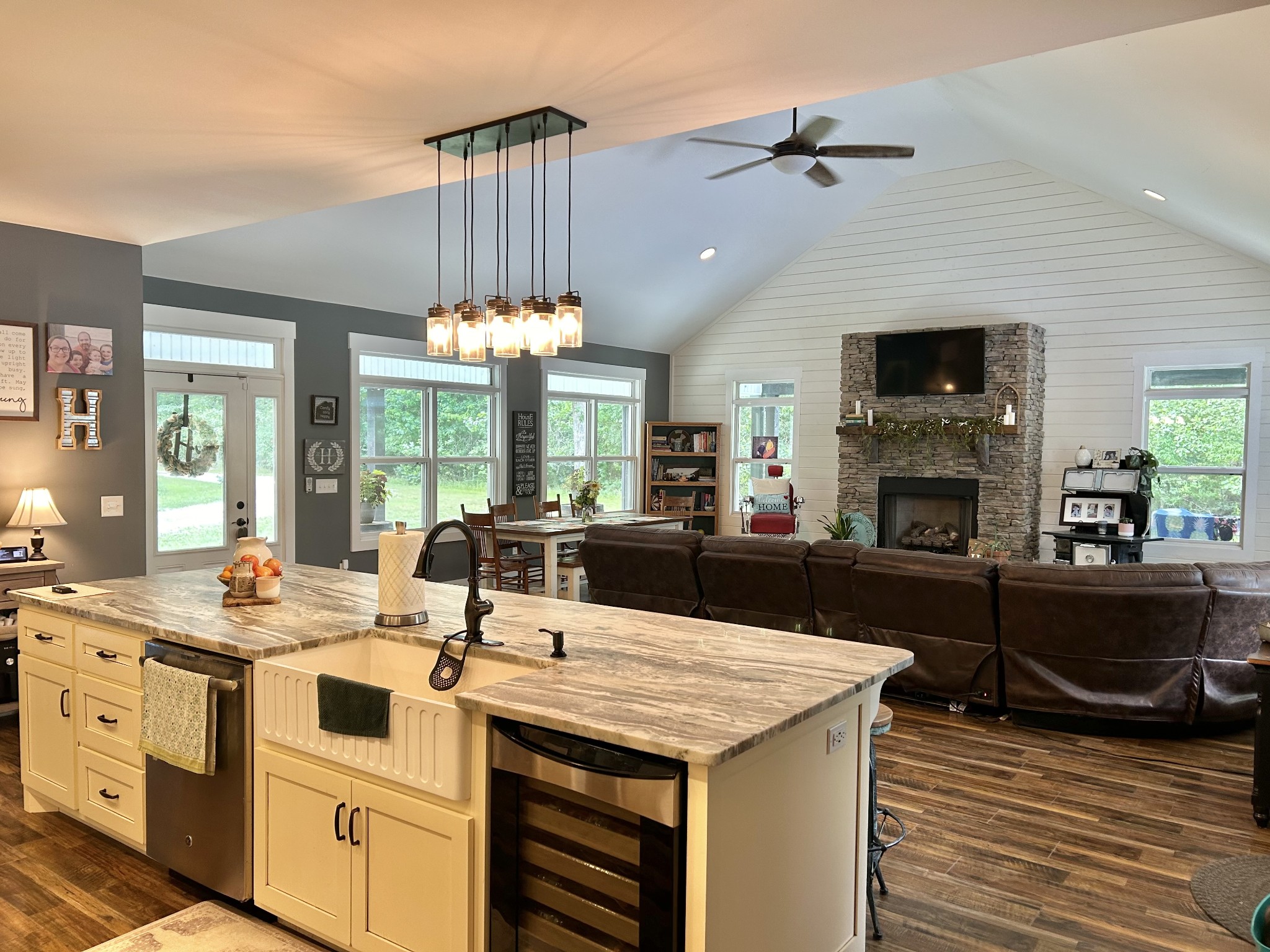 795 Cat Creek Road Manchester, TN 37355 - Photo 17 of 58 a kitchen with a stove a kitchen island a sink and a stove