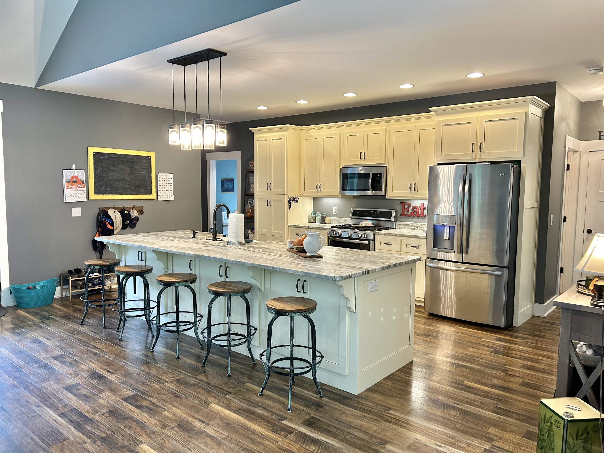 795 Cat Creek Road Manchester, TN 37355 - Photo 20 of 58 a kitchen with stainless steel appliances a refrigerator stove microwave and cabinets