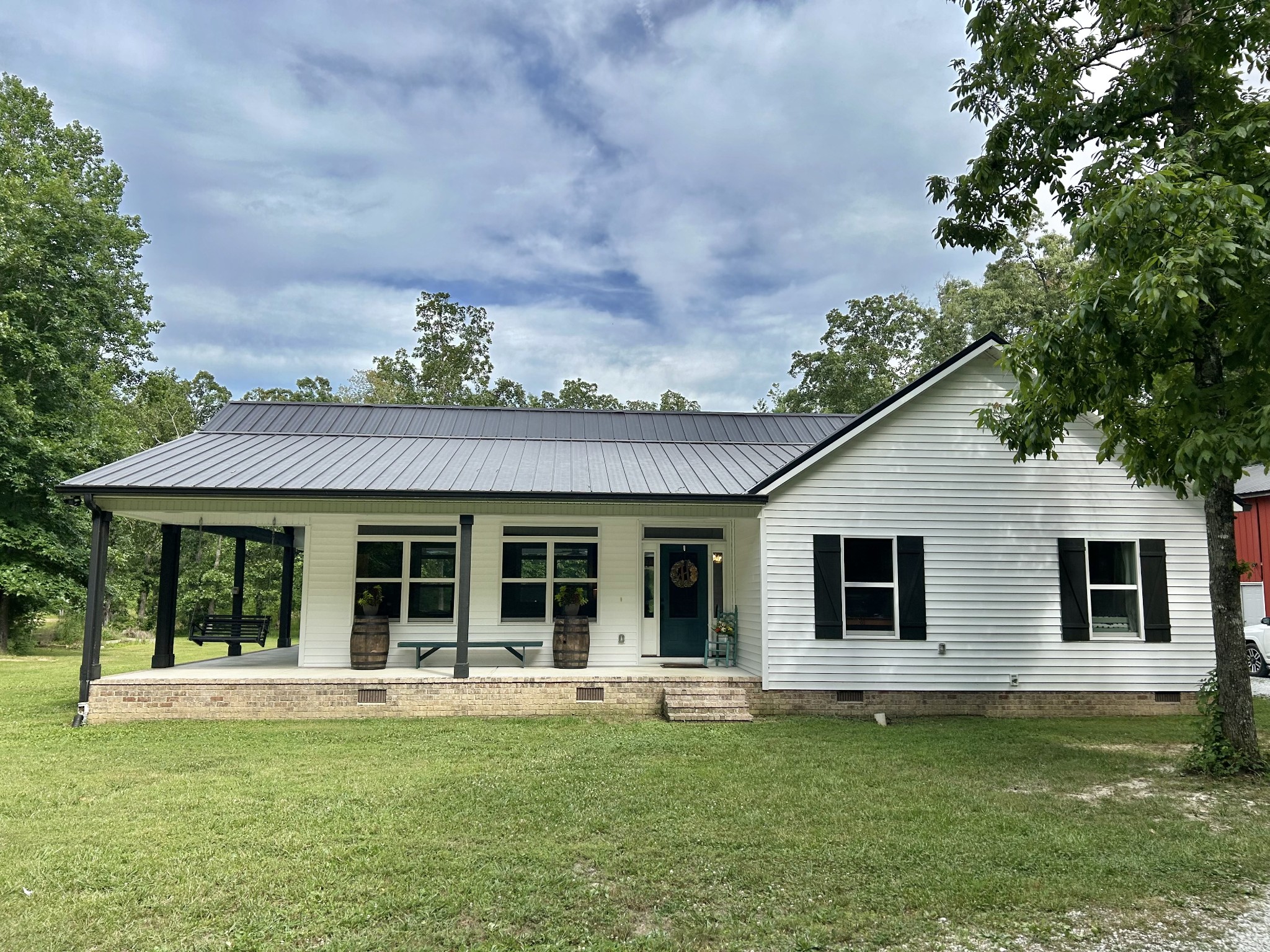 795 Cat Creek Road Manchester, TN 37355 - Photo 2 of 58 a view of a house with a swimming pool and a yard