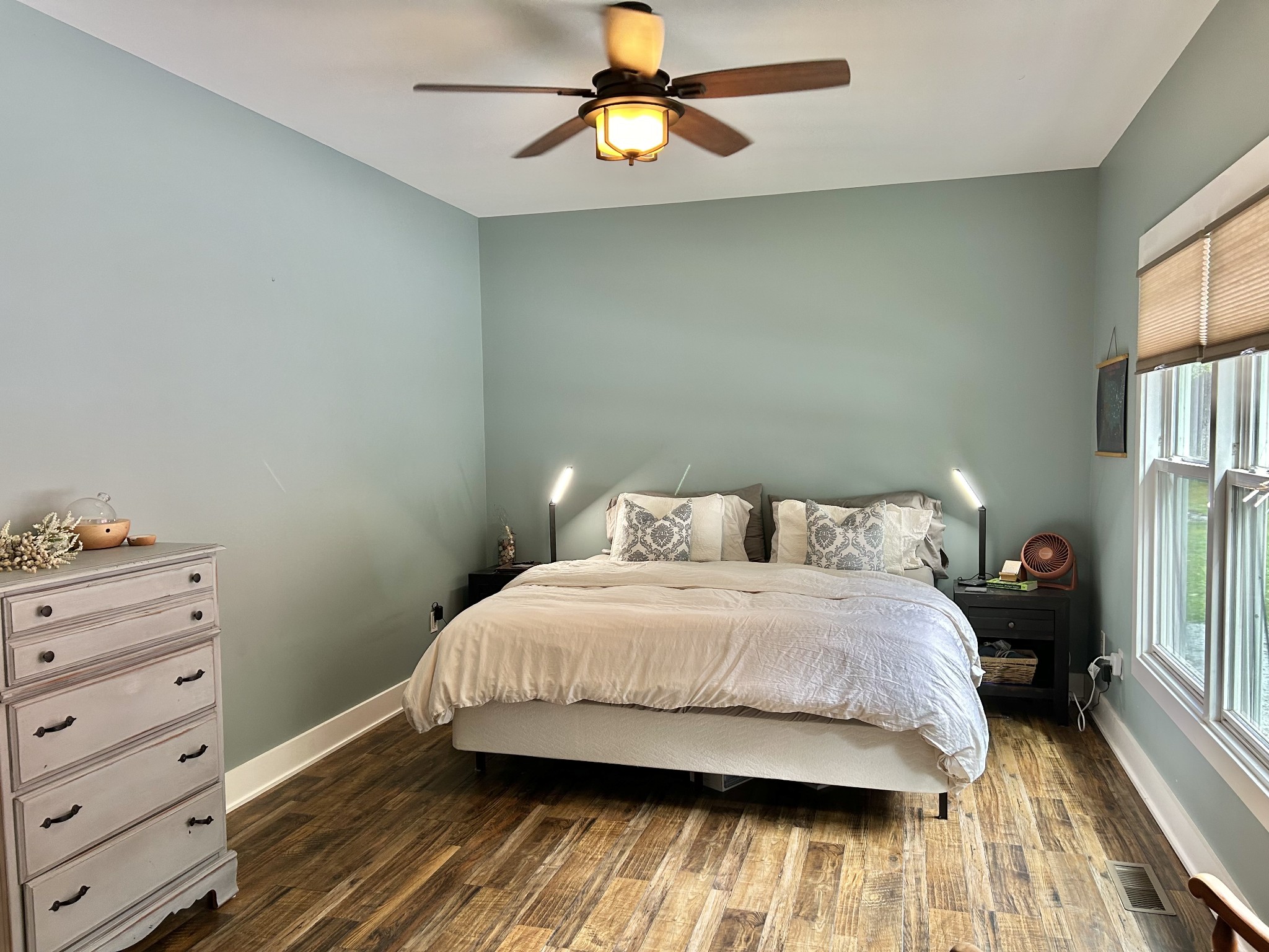 795 Cat Creek Road Manchester, TN 37355 - Photo 25 of 58 a bedroom with a bed and a chandelier