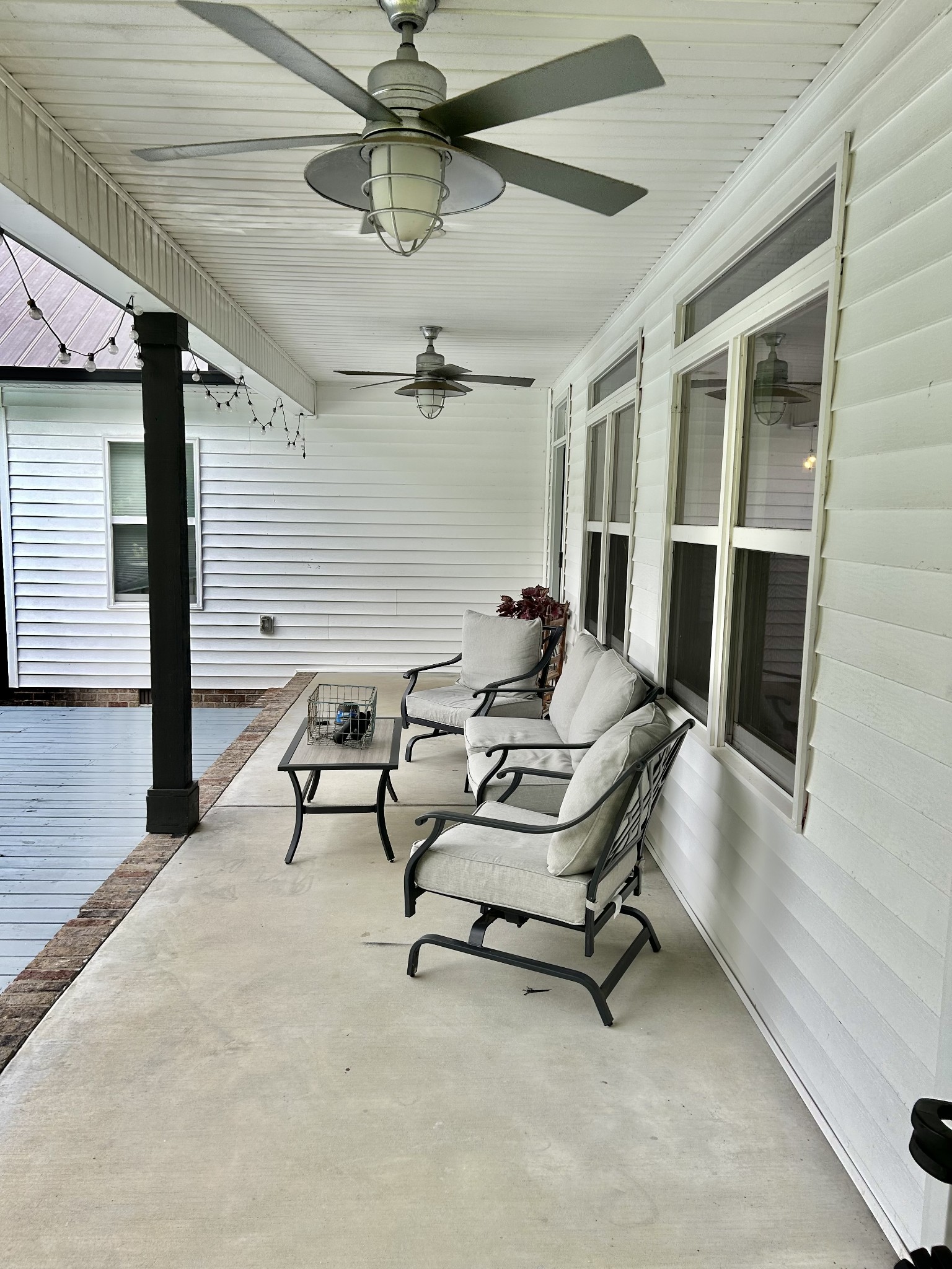 795 Cat Creek Road Manchester, TN 37355 - Photo 39 of 58 a view of a patio with a table and chairs