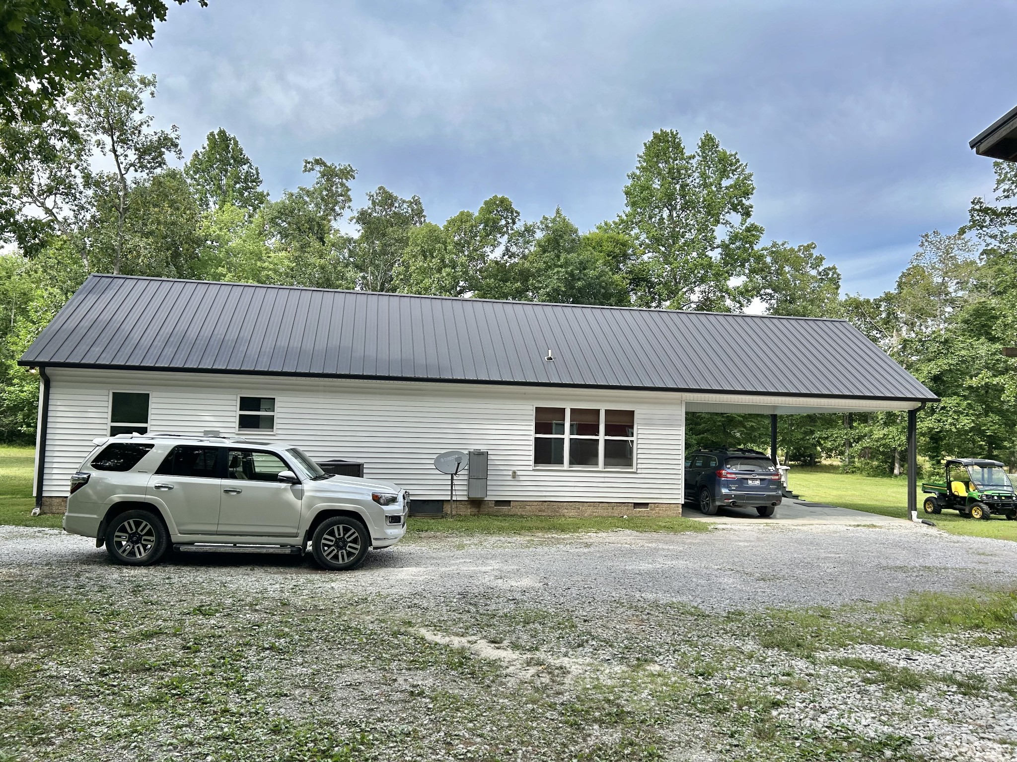 795 Cat Creek Road Manchester, TN 37355 - Photo 45 of 58 a view of a car parked in front of a house