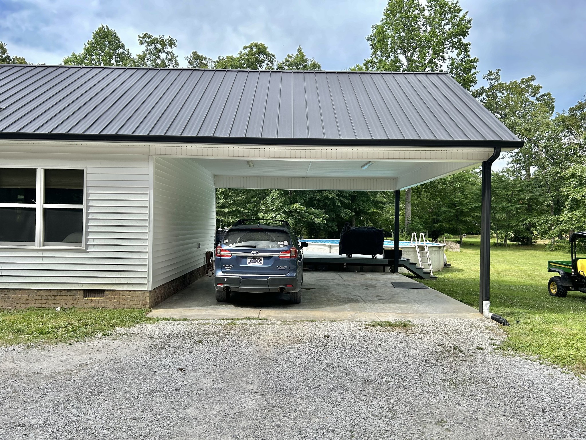 795 Cat Creek Road Manchester, TN 37355 - Photo 46 of 58 a view of backyard of house with car parked
