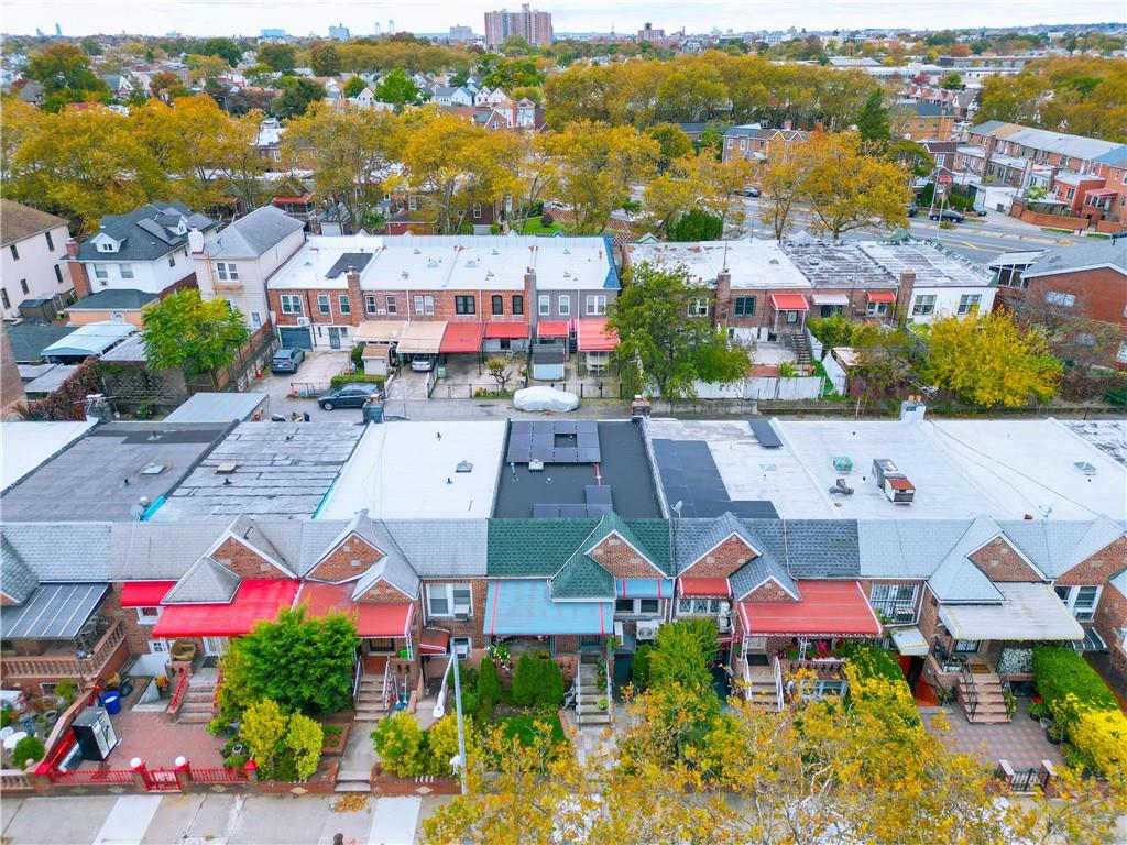1200 East 49th Street Brooklyn, NY 11234 - Photo 11 of 30 an aerial view of residential houses with outdoor space