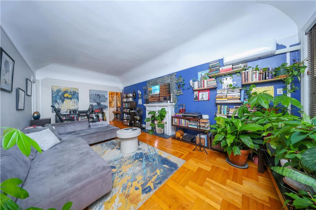 1200 East 49th Street Brooklyn, NY 11234 - Photo 12 of 30 a living room with patio furniture and a potted plant