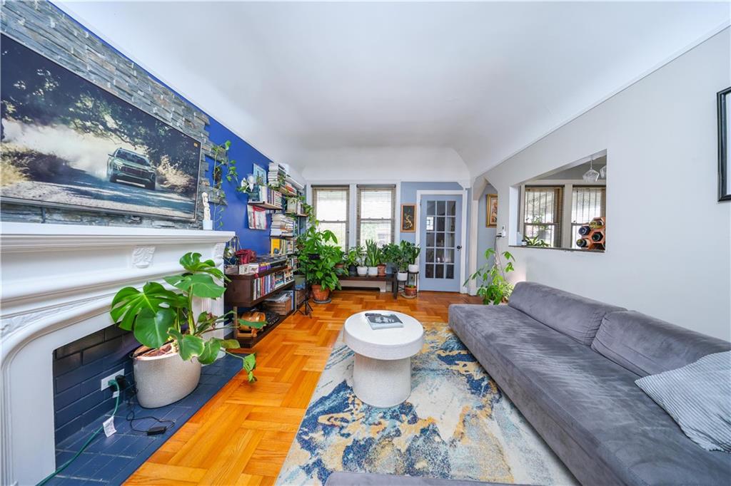 1200 East 49th Street Brooklyn, NY 11234 - Photo 14 of 30 a living room with furniture and a potted plant