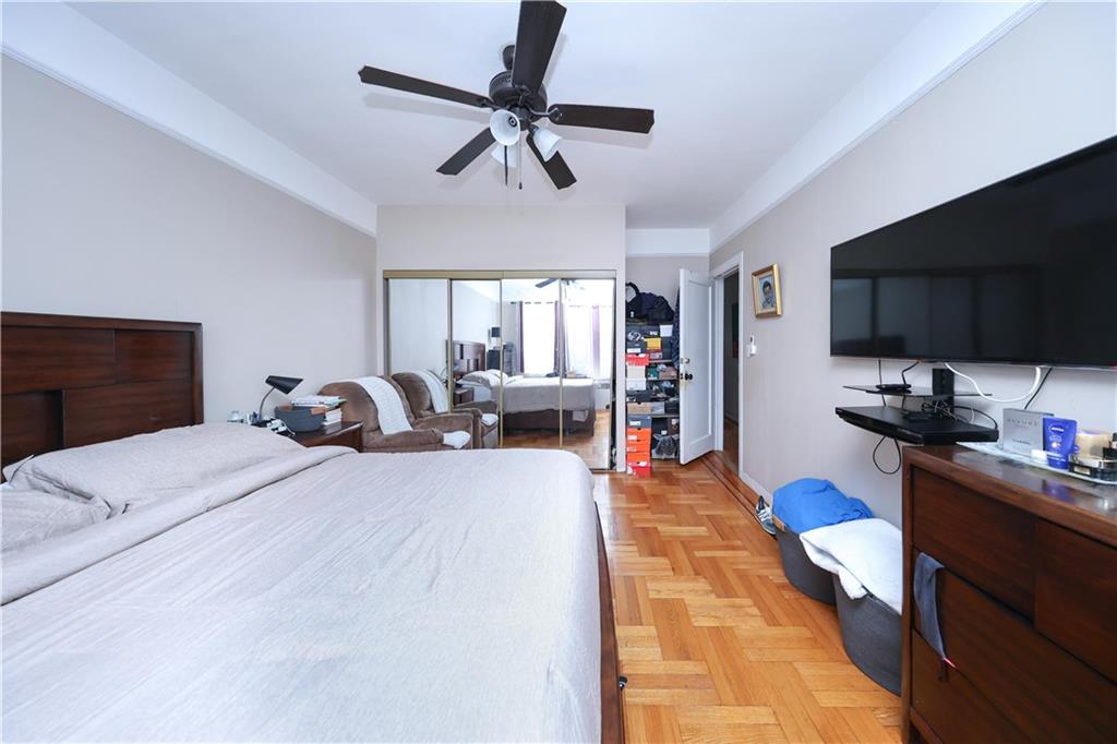 1200 East 49th Street Brooklyn, NY 11234 - Photo 17 of 30 a bed room with a bed a television and dresser