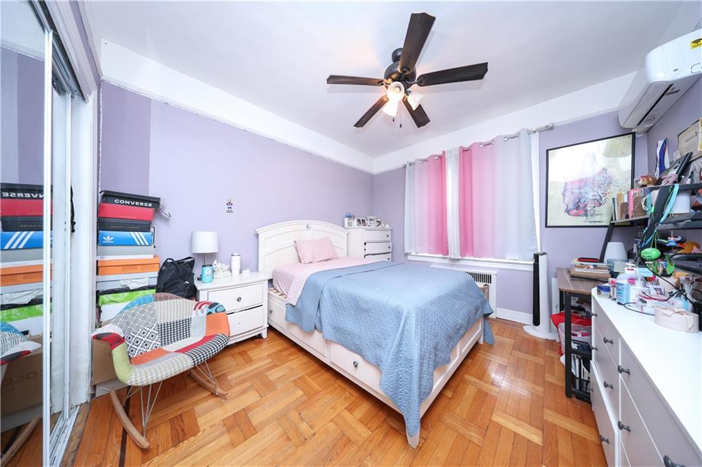 1200 East 49th Street Brooklyn, NY 11234 - Photo 24 of 30 a bedroom with a bed furniture and a window