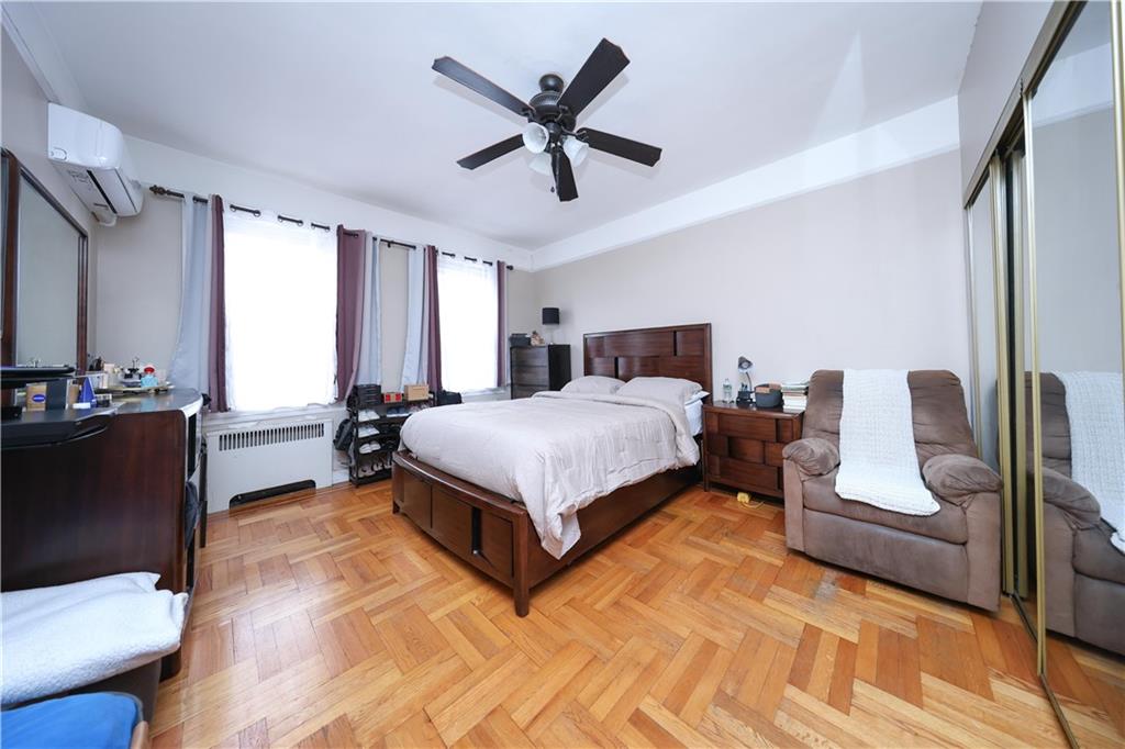 1200 East 49th Street Brooklyn, NY 11234 - Photo 25 of 30 a bedroom with a bed and window