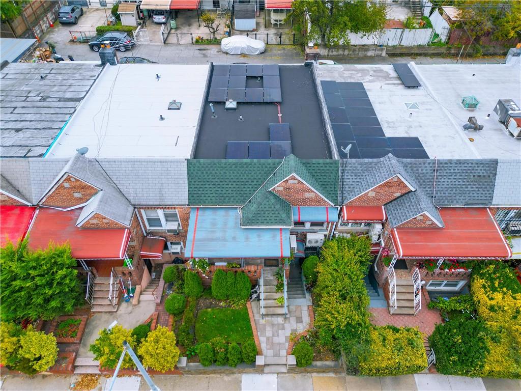1200 East 49th Street Brooklyn, NY 11234 - Photo 6 of 30 an aerial view of multiple houses with a yard
