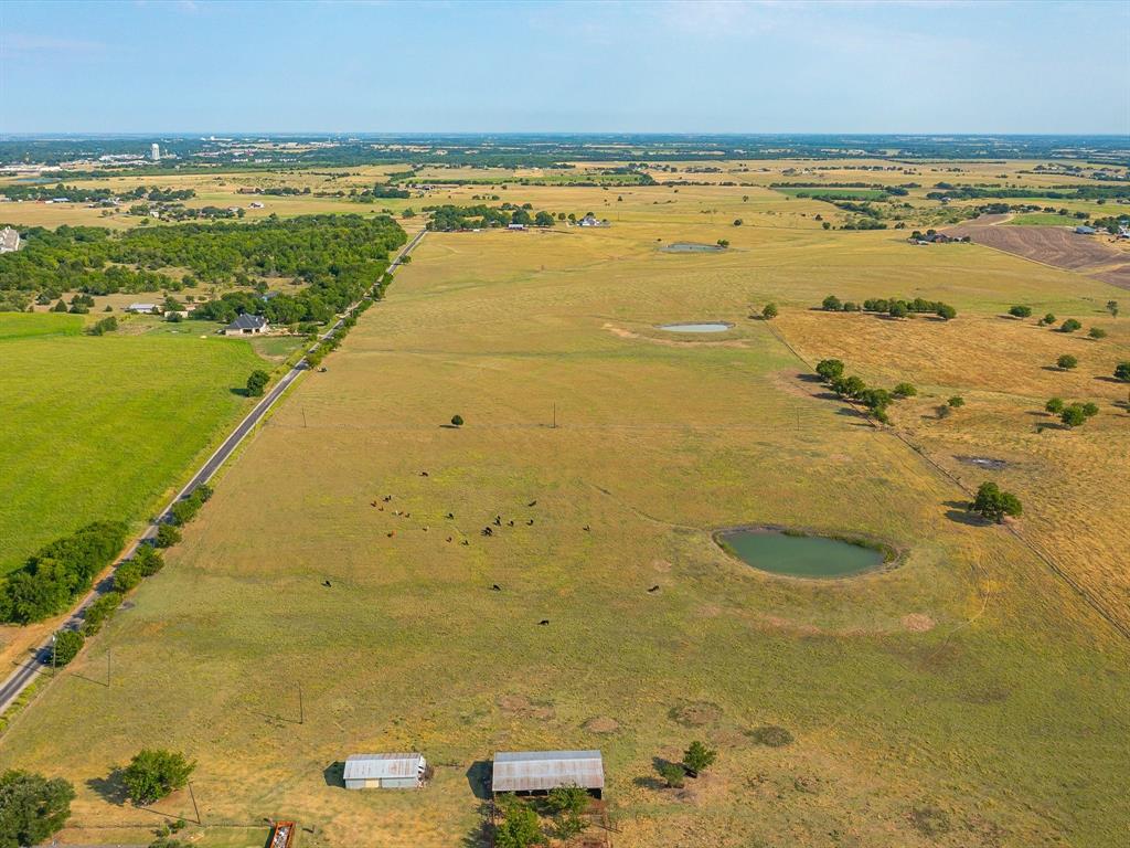 Tbd Lot 7 R Tbd Road Ennis, TX 75119 - Photo 3 of 6 a view of an ocean and beach