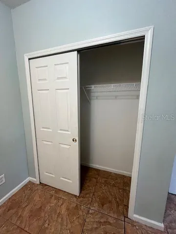 an empty room with closet