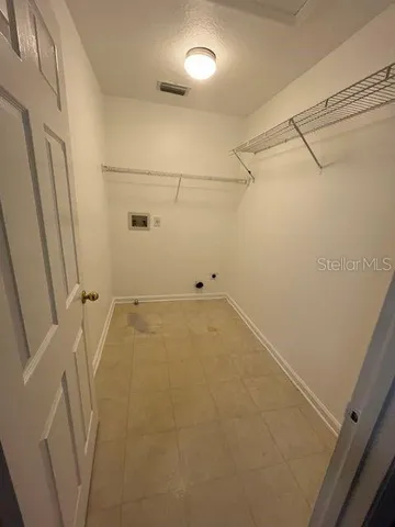 a view of a room with racks on the wall