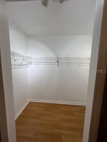 a view of a room with racks on the wall