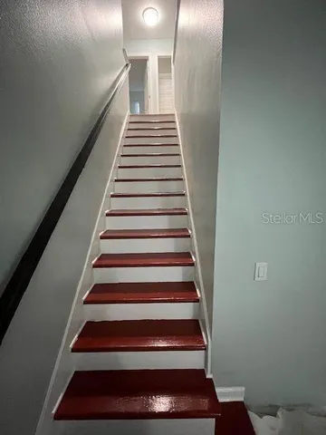 a bathroom with a double vanity sink and mirror