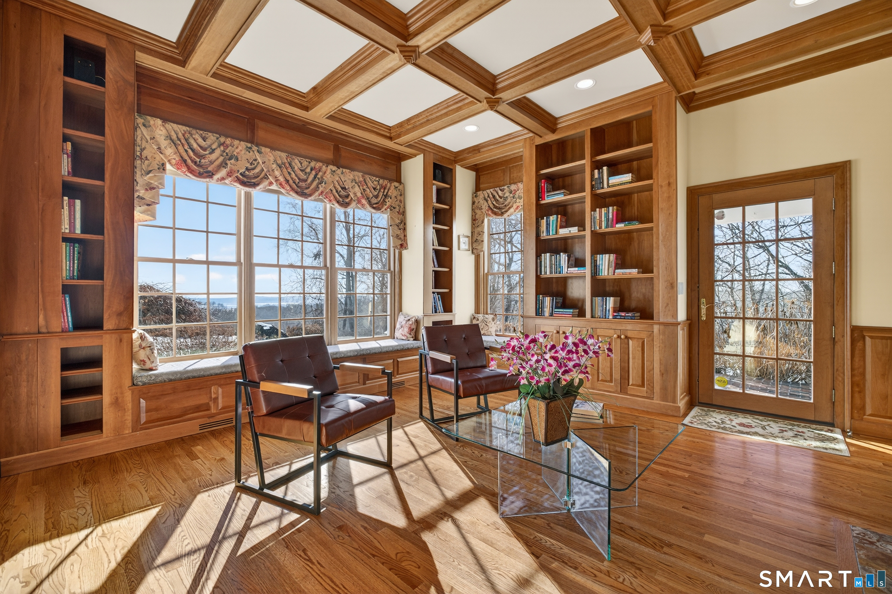 134 River Road Essex, CT 06426 - Photo 17 of 39 a view of a dining room with furniture and wooden floor