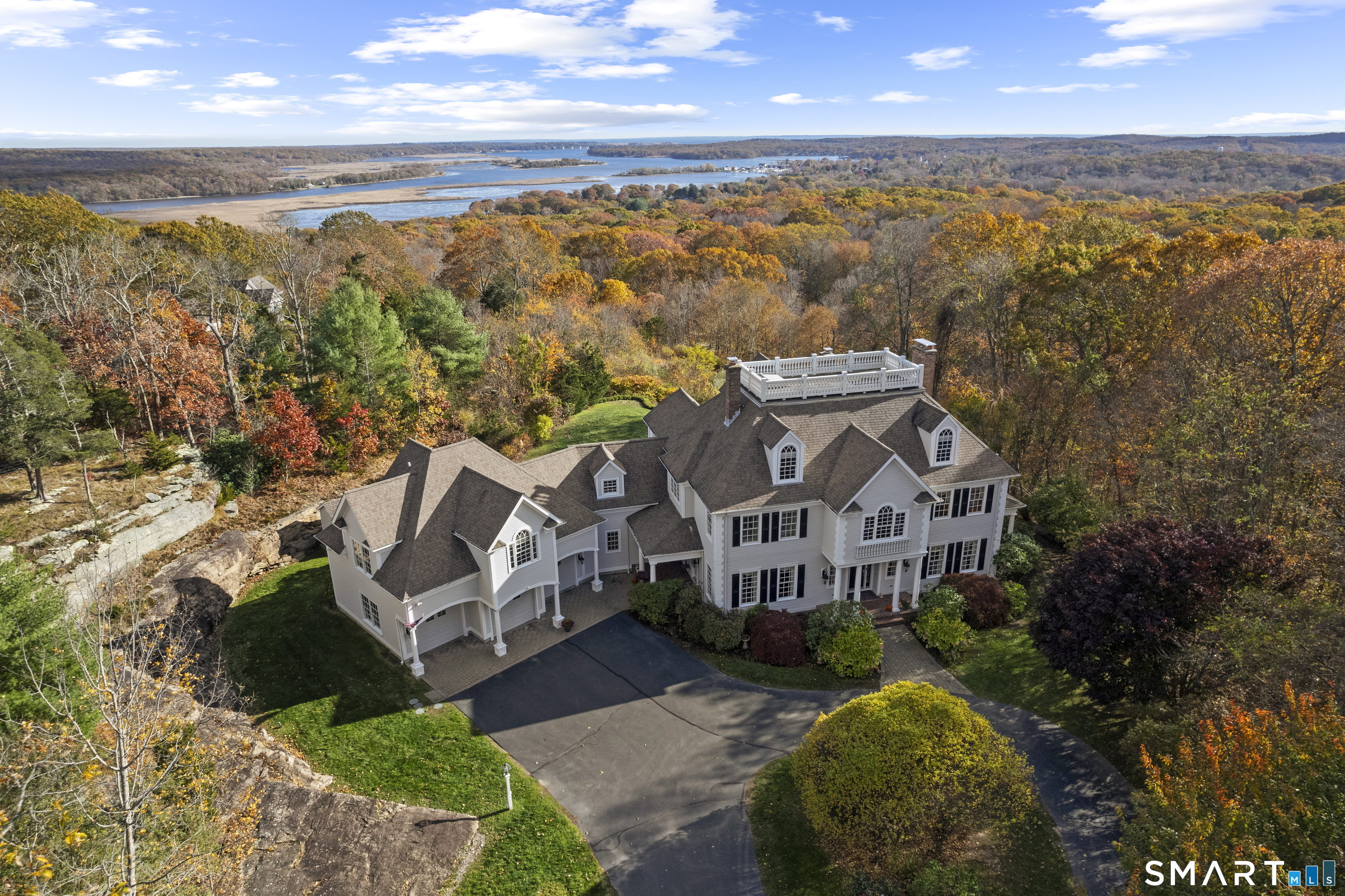134 River Road Essex, CT 06426 - Photo 2 of 39 a view of a city with ocean view
