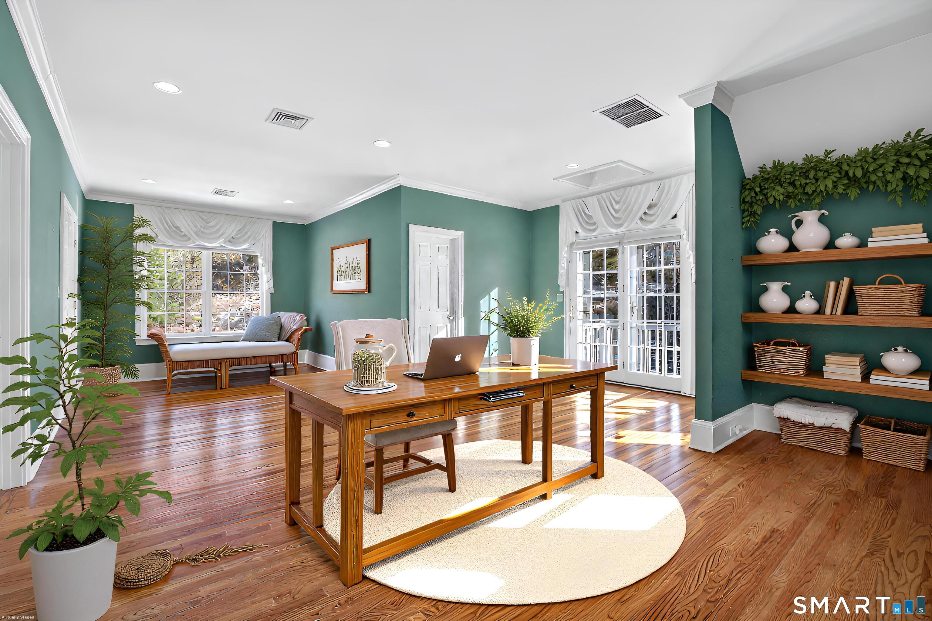 134 River Road Essex, CT 06426 - Photo 32 of 39 a living room with furniture and a wooden floor