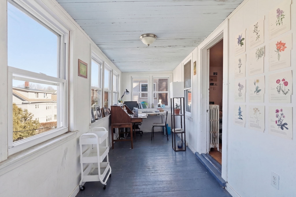 14 Stockwell Street, Unit 2 Boston, MA 02120 - Photo 14 of 29 a living room with furniture and a window