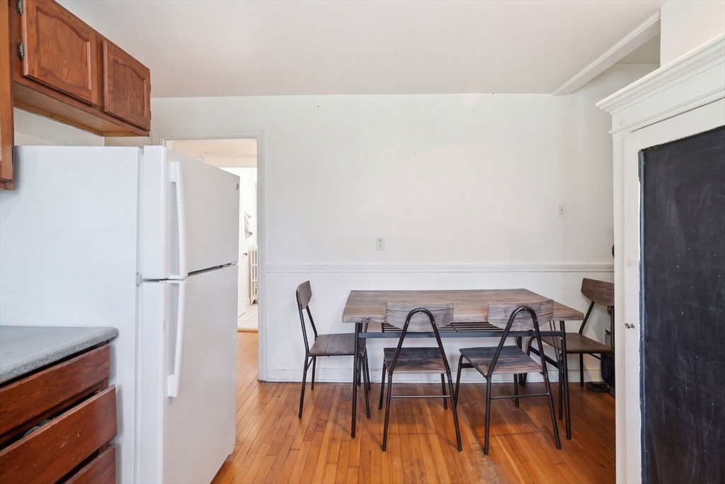 14 Stockwell Street, Unit 2 Boston, MA 02120 - Photo 27 of 29 a view of a dining room with furniture and wooden floor