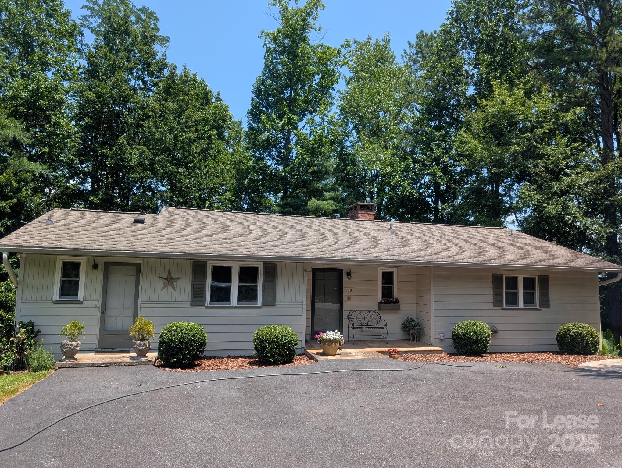 110 Hillside Court Tryon, NC 28782 - Photo 1 of 11 front view of a house with a patio