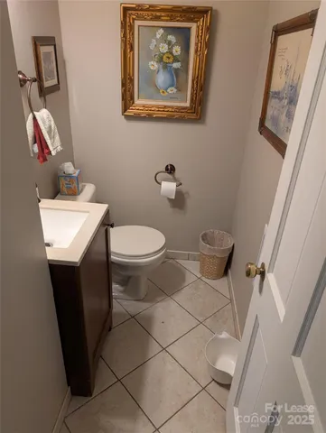 a bathroom with a toilet and a sink