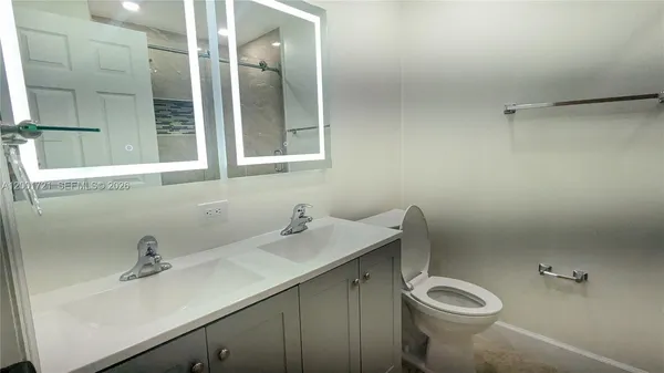 an empty room with a empty space and windows