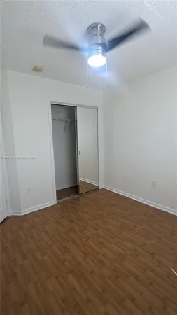 a bathroom with a tub and shower