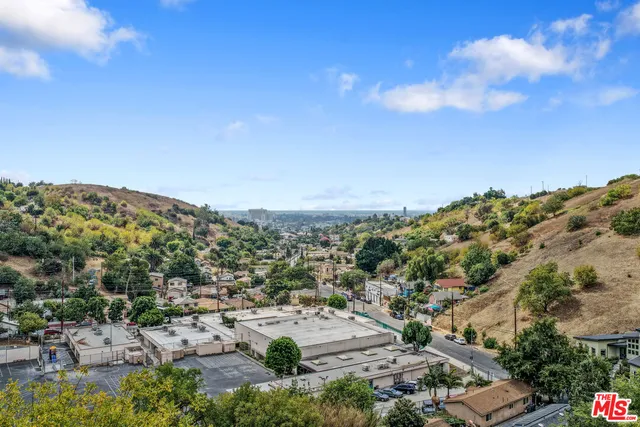 a view of a lot of trees and houses