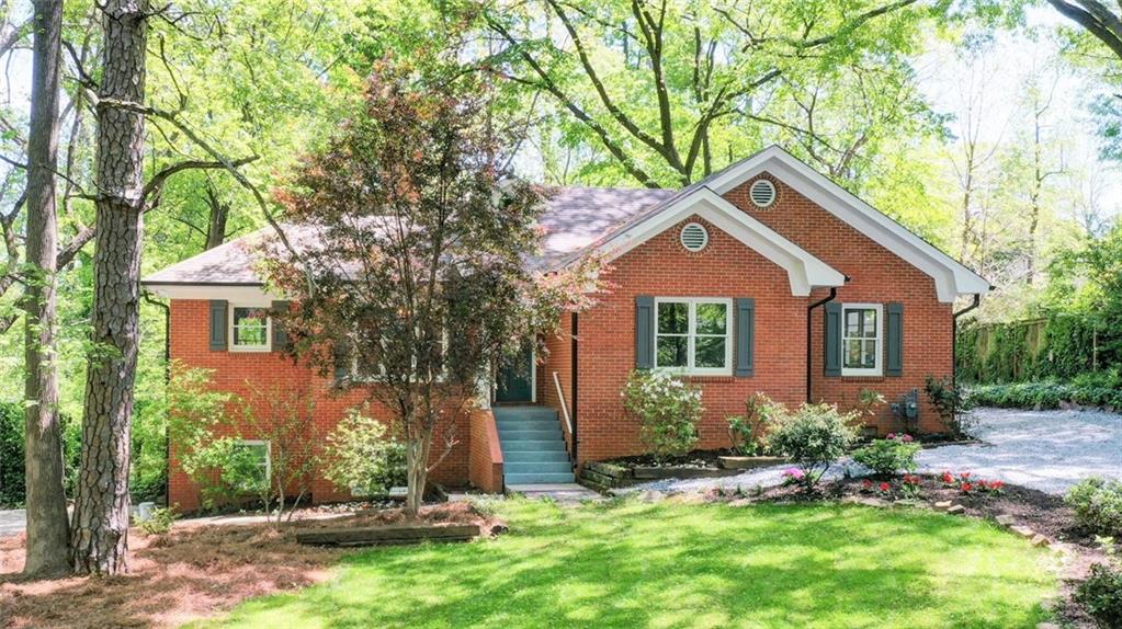 118 Mckoy Street Decatur, GA 30030 - Photo 1 of 1 a front view of house with a garden