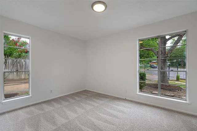 a view of a room that has a large window