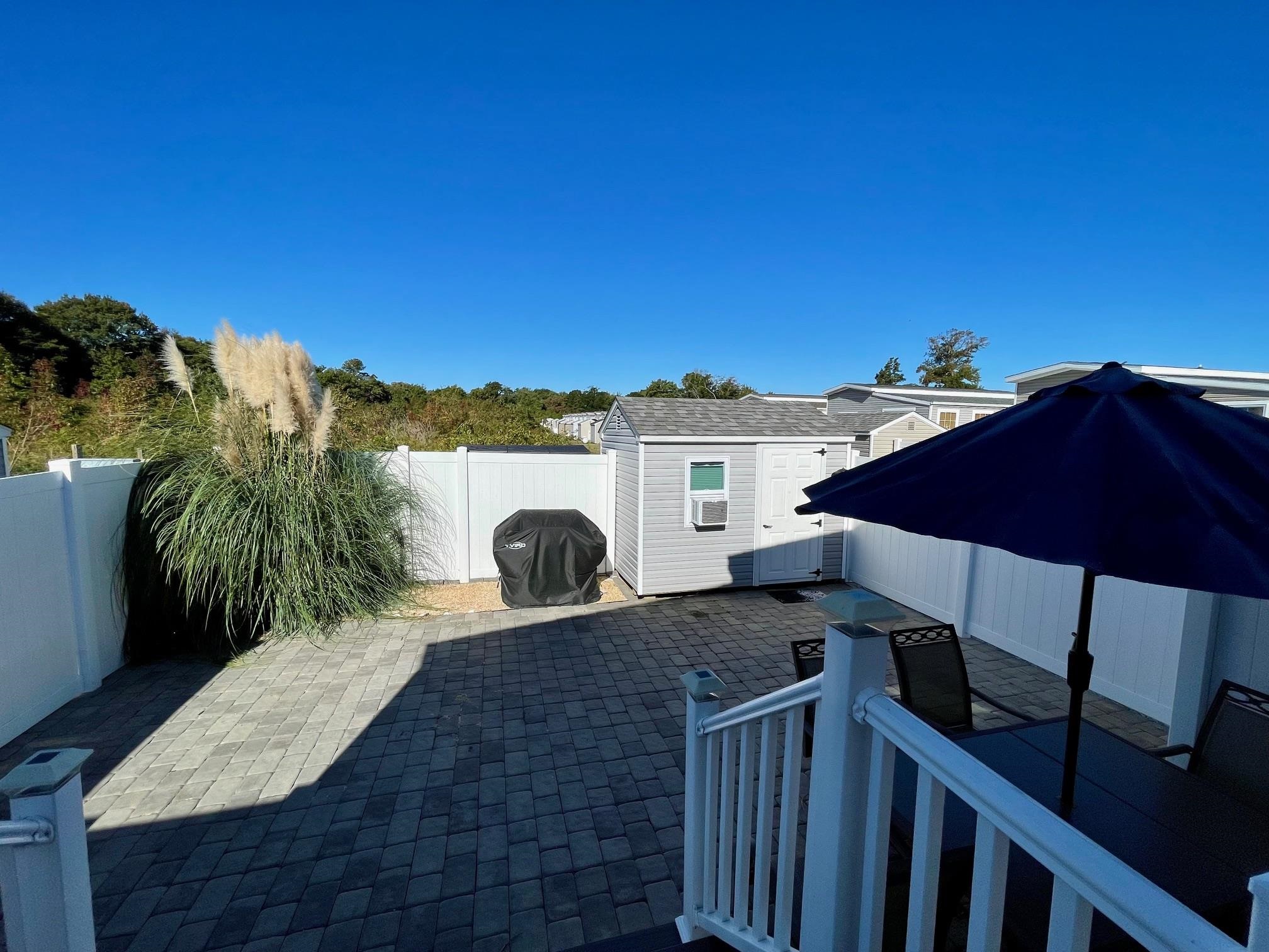 4100 Rte 9 South, Unit 84 Rio Grande, NJ 08242 - Photo 9 of 22 a view of a terrace with a garden
