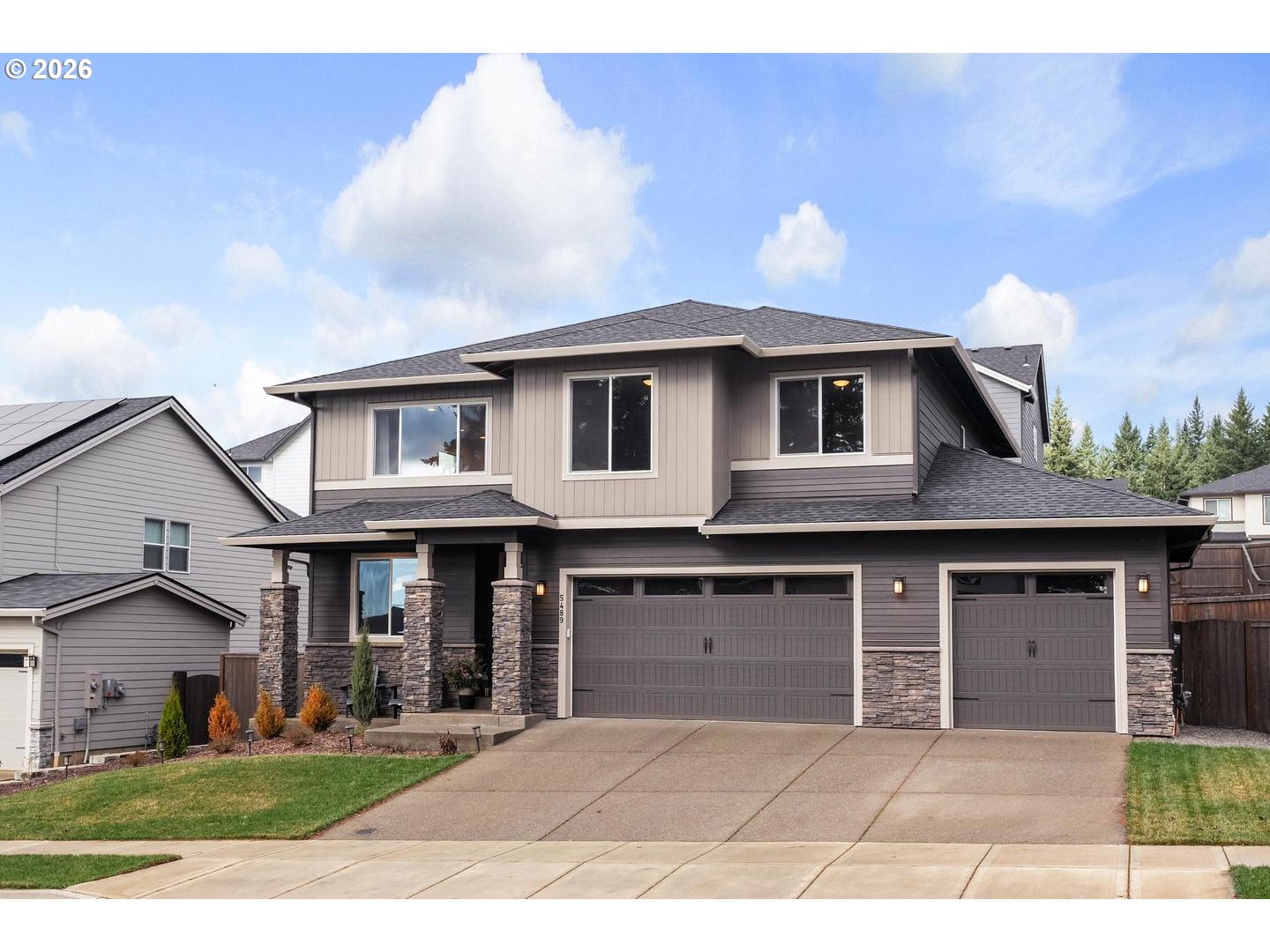 5489 North 91st Avenue Camas, WA 98607 - Photo 1 of 44 a front view of a house with a yard