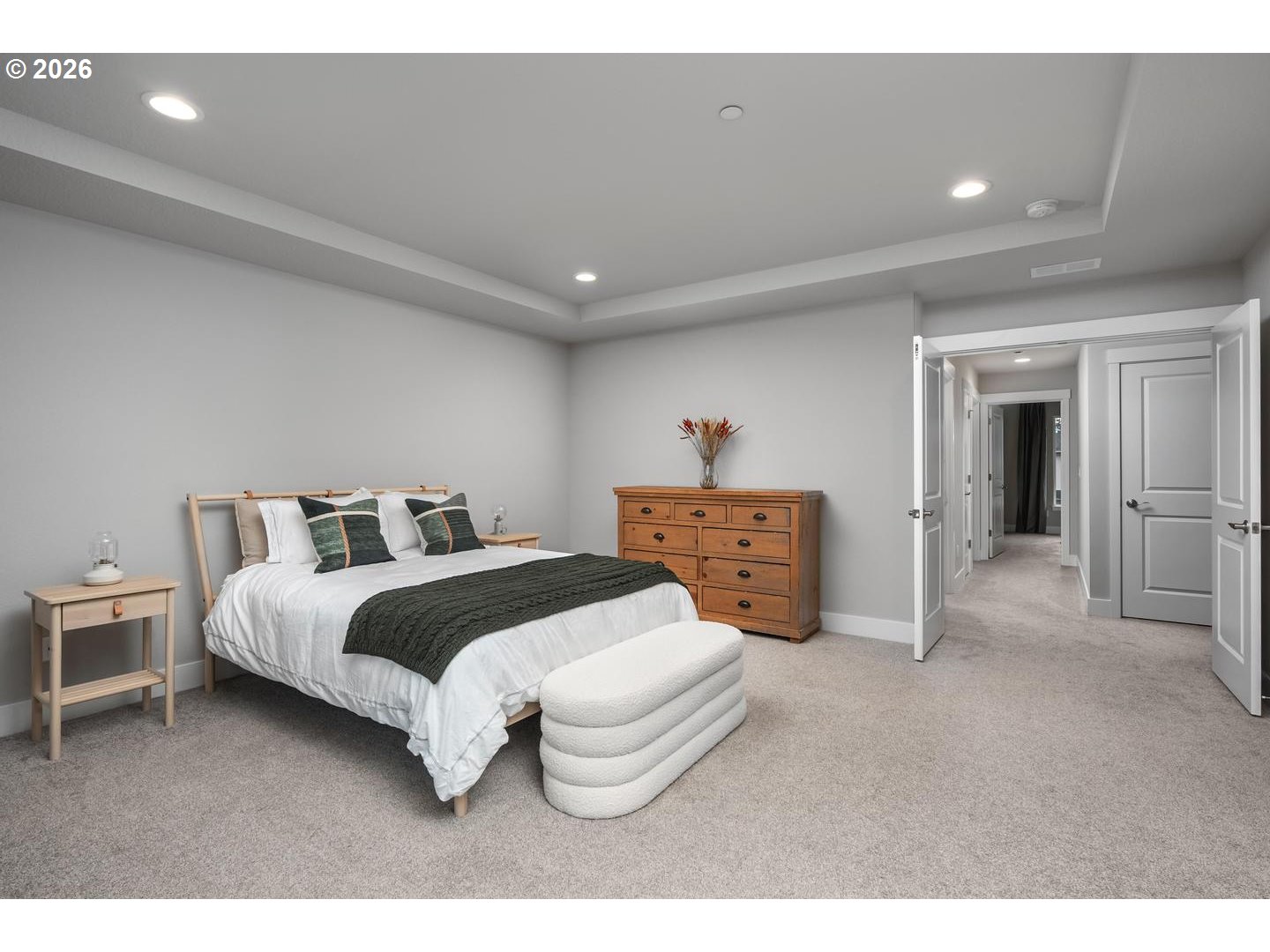 5489 North 91st Avenue Camas, WA 98607 - Photo 26 of 44 a spacious bedroom with a bed and a view