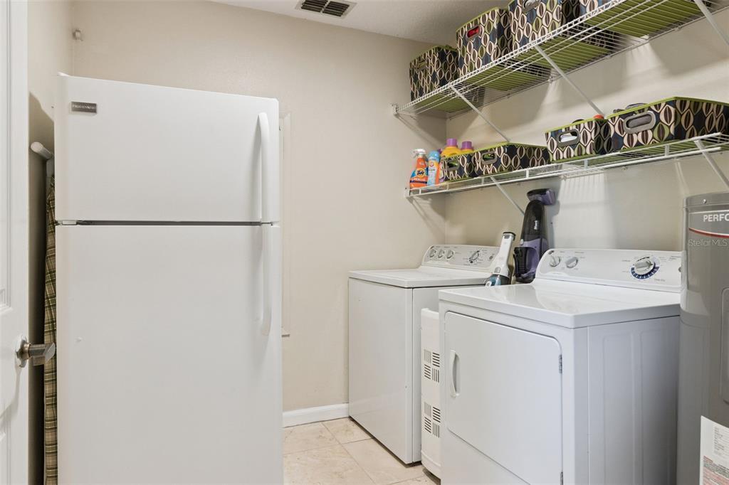 1256 Center Street Dundee, FL 33838 - Photo 27 of 41 a utility room with dryer and washer