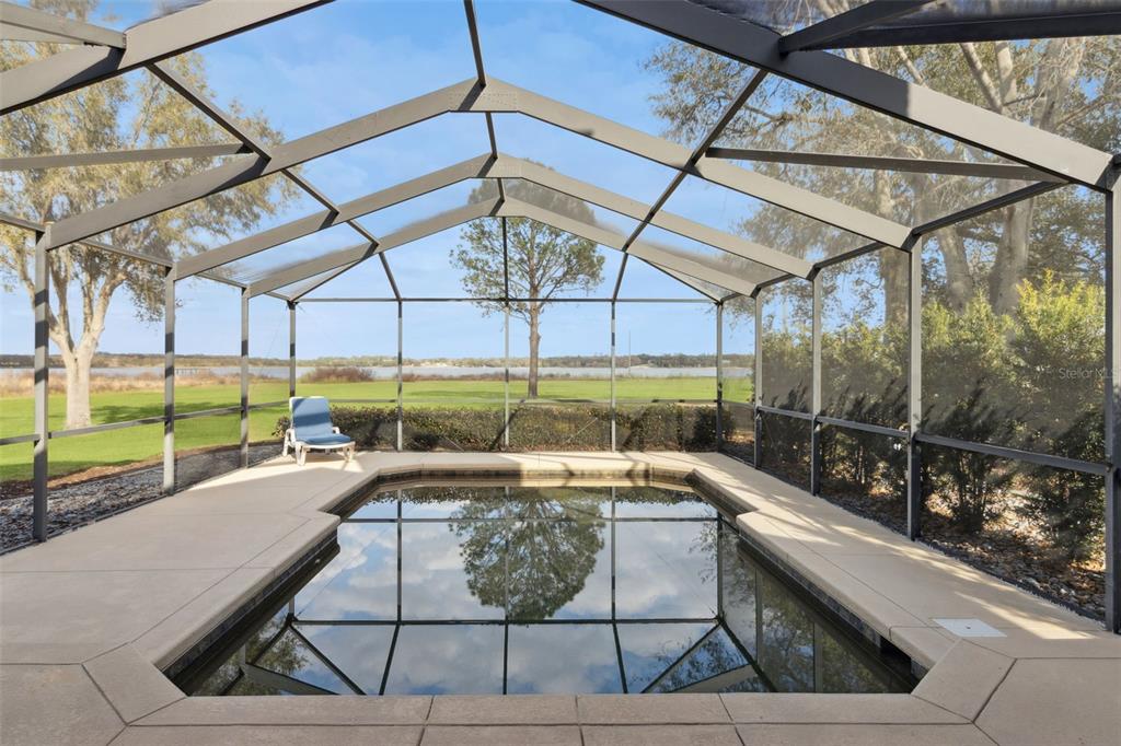 1256 Center Street Dundee, FL 33838 - Photo 31 of 41 a view of a couches and table in the patio