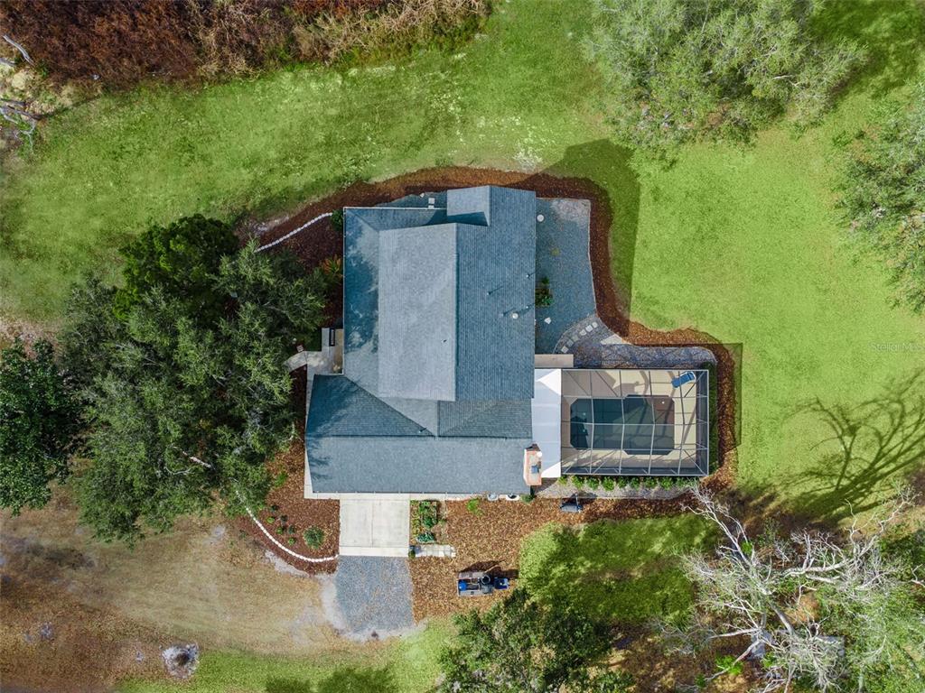 1256 Center Street Dundee, FL 33838 - Photo 35 of 41 an aerial view of a house with a yard