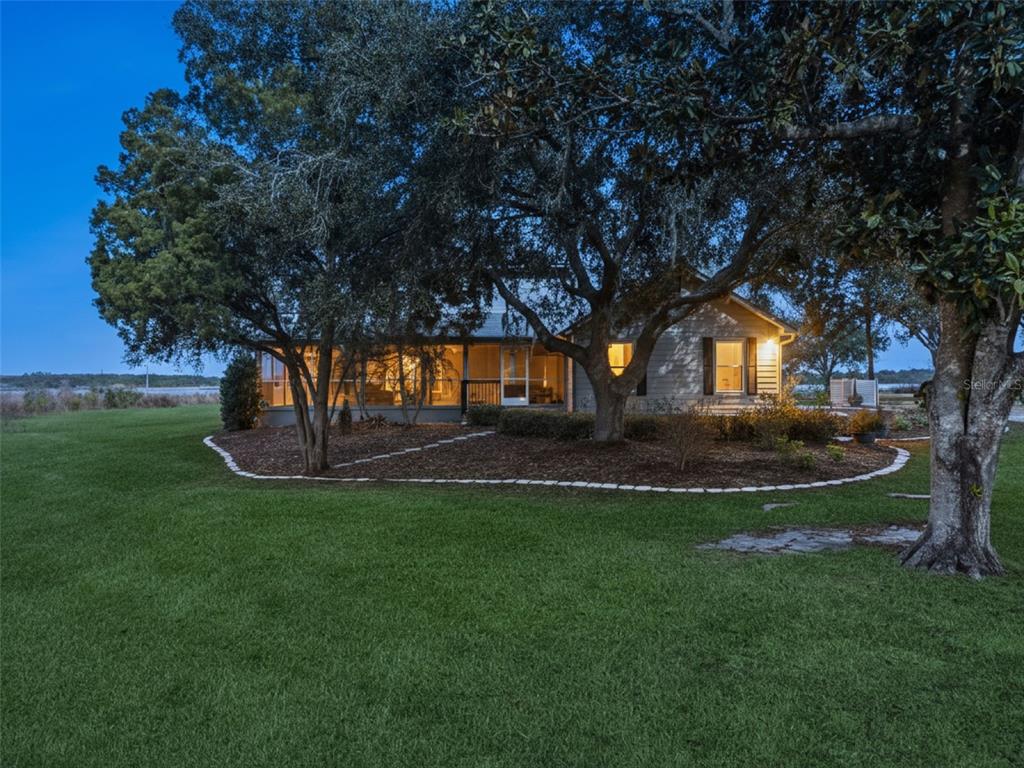 1256 Center Street Dundee, FL 33838 - Photo 39 of 41 a view of garden with trees