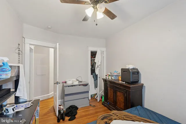 a bedroom with furniture and a bed