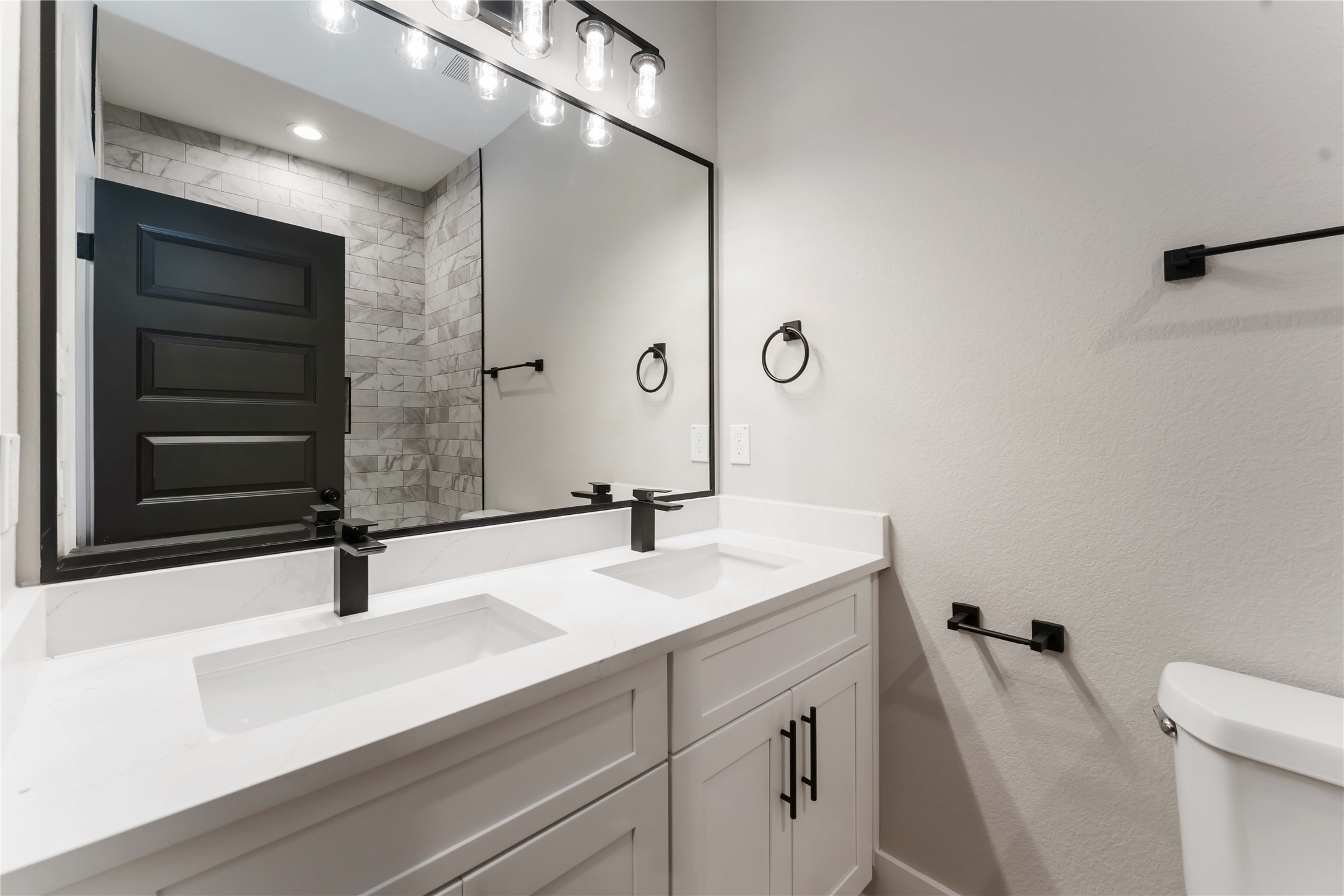 4201 Mallow Street Houston, TX 77051 - Photo 11 of 23 a bathroom with a sink a toilet and shower