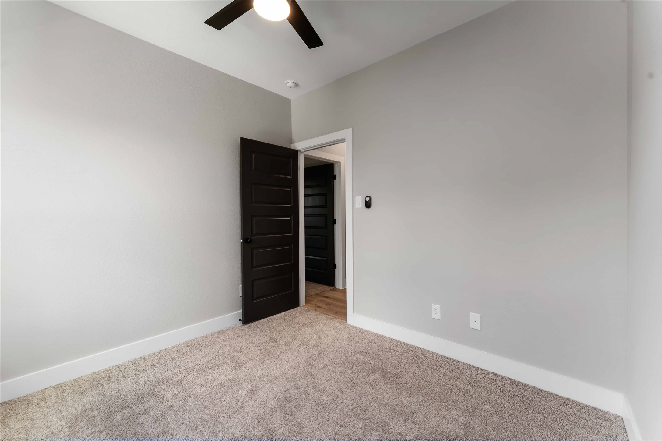 4201 Mallow Street Houston, TX 77051 - Photo 12 of 23 an empty room with closet and a ceiling fan