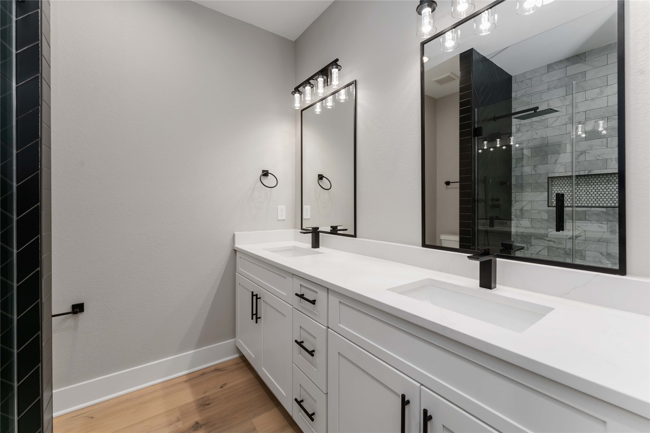 4201 Mallow Street Houston, TX 77051 - Photo 18 of 23 a bathroom with a sink and a mirror